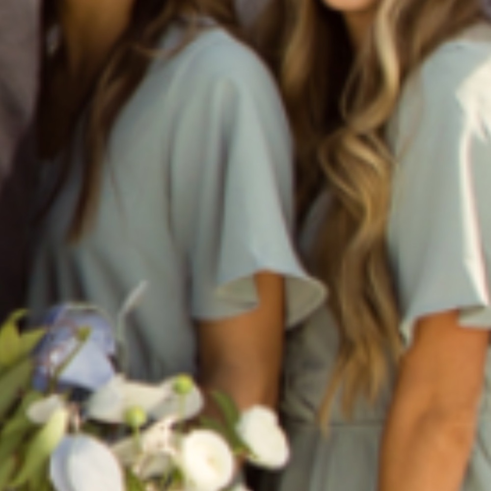 Beautiful blue green maxi with button details and flutter sleeves.